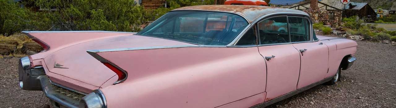 Old Pink Coupe Parked | Breast Cancer Car Donations