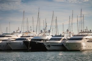 Five Yachts on Body of Water | Breast Cancer Car Donations