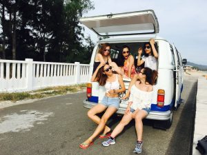 Photo of Five Women Sitting in Back of Van | Breast Cancer Car Donations