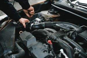 Checking the Engine of a Car | Breast Cancer Car Donations